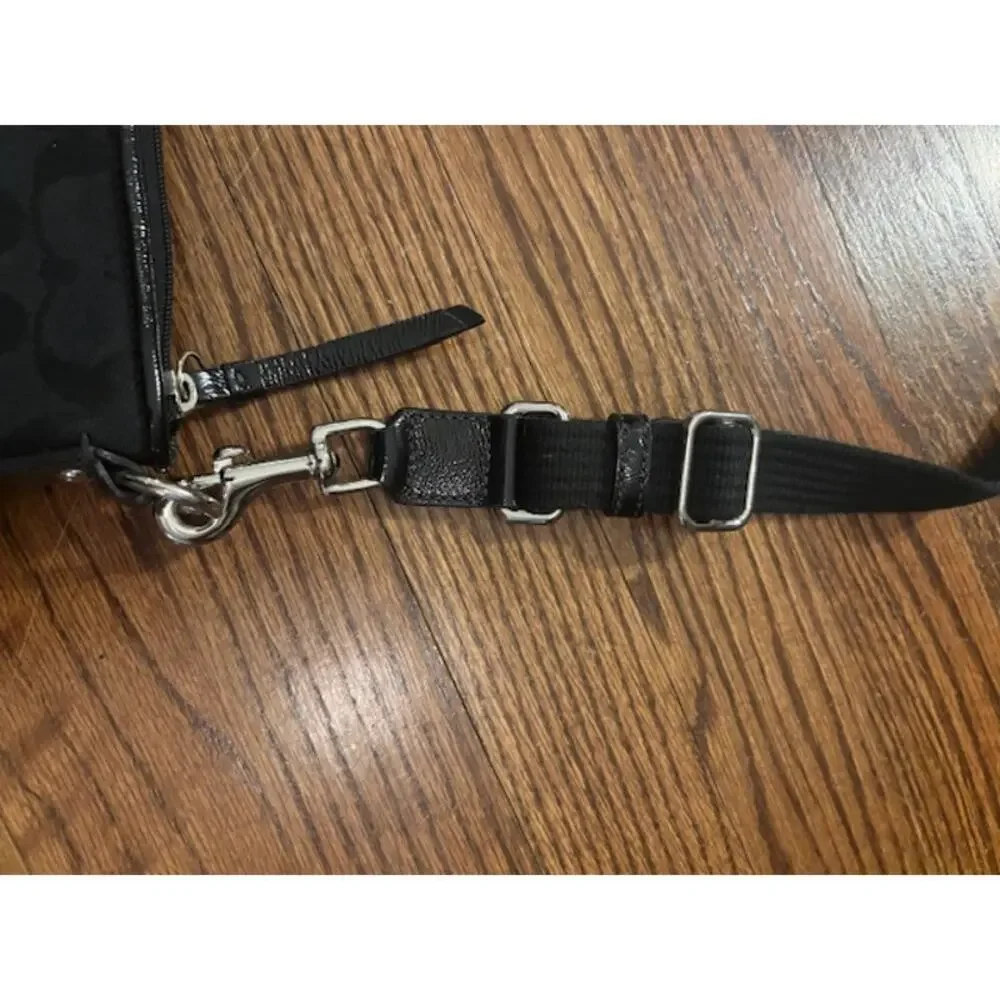 Coach crossbody handbag purse adjustable strap black jacquard logo spellout